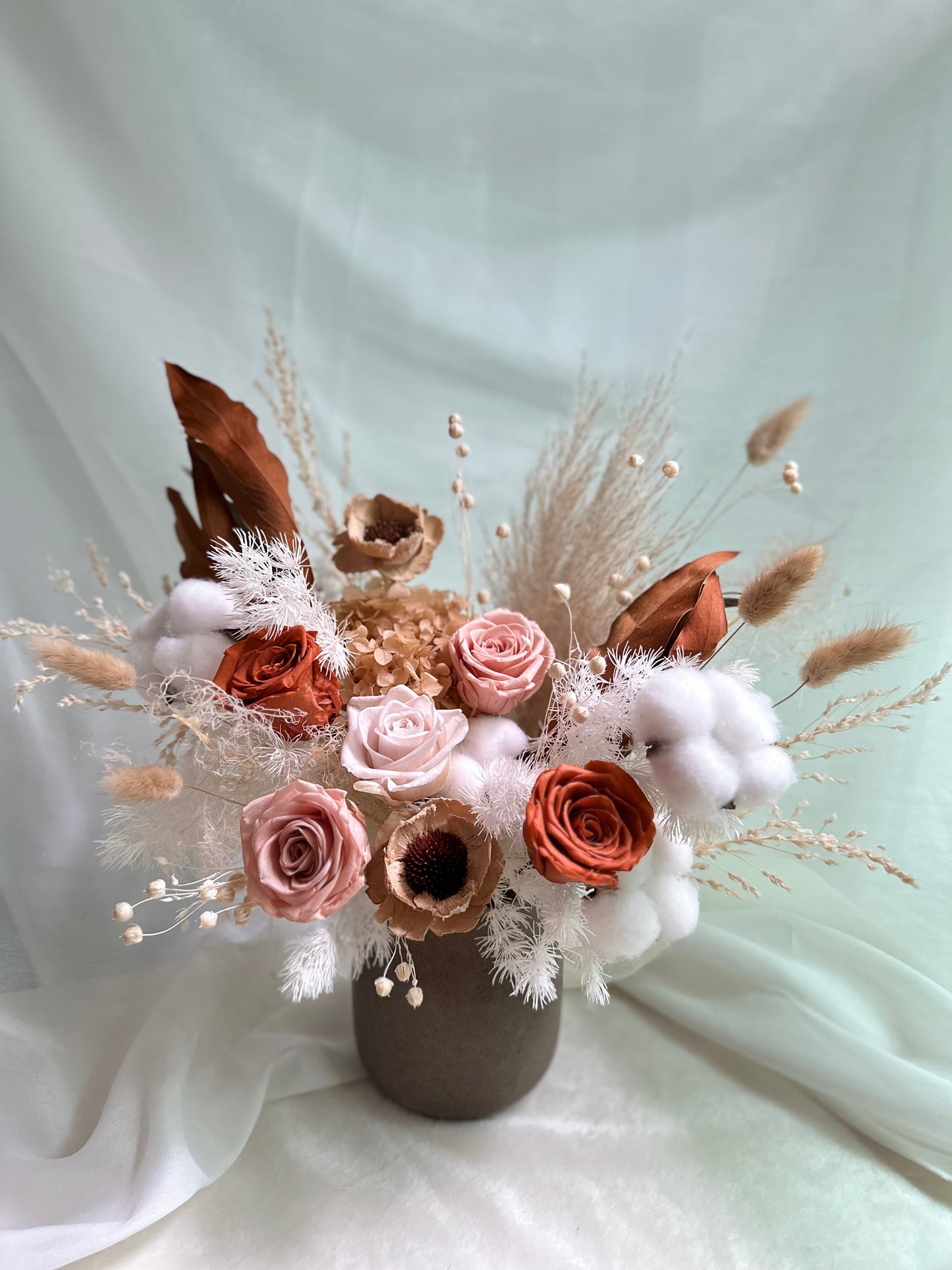 Preserved floral vase in earthy tones
