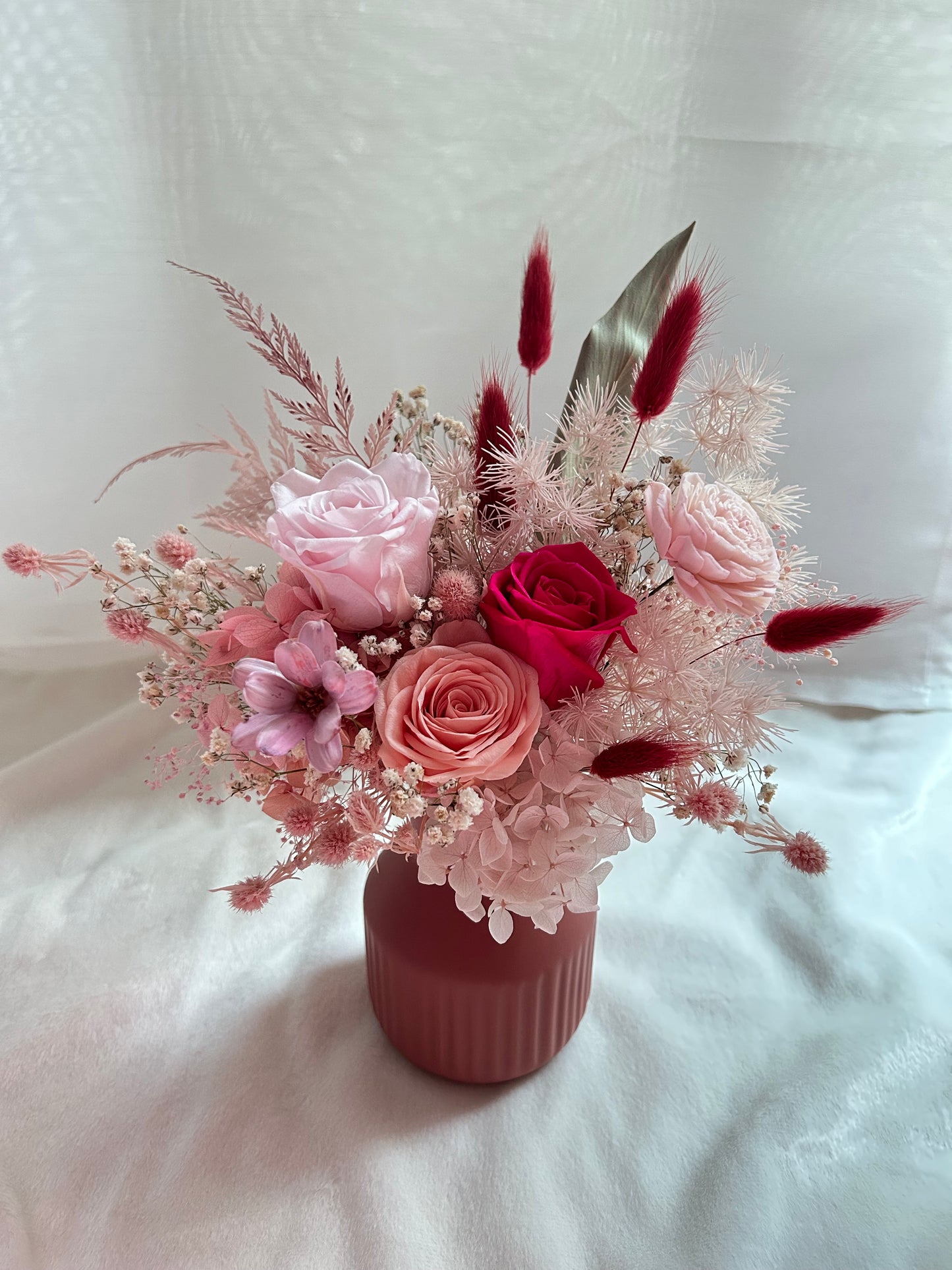 Hot pink preserved rose vase arrangement
