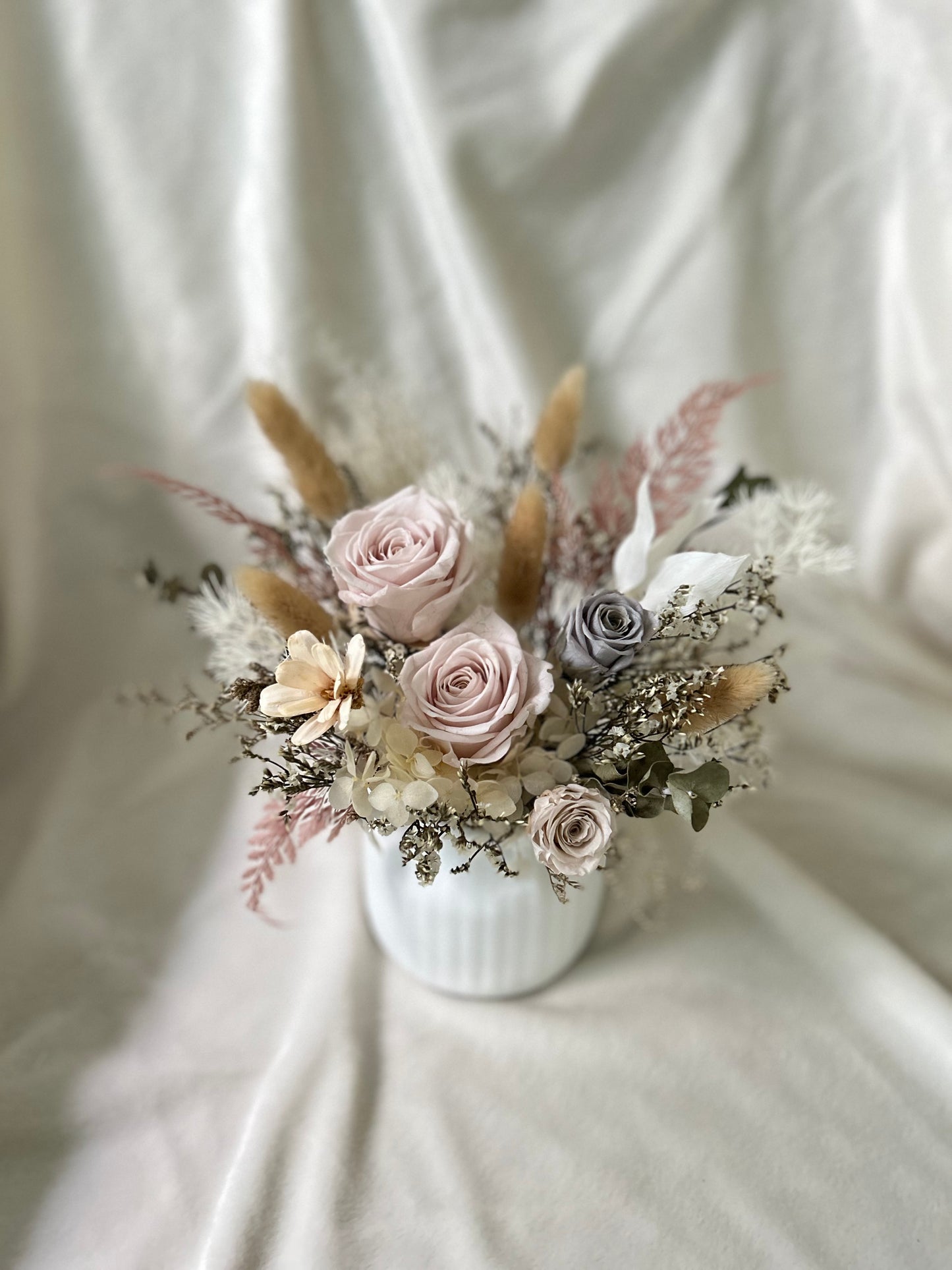 Muted tones and pink pastel vase display