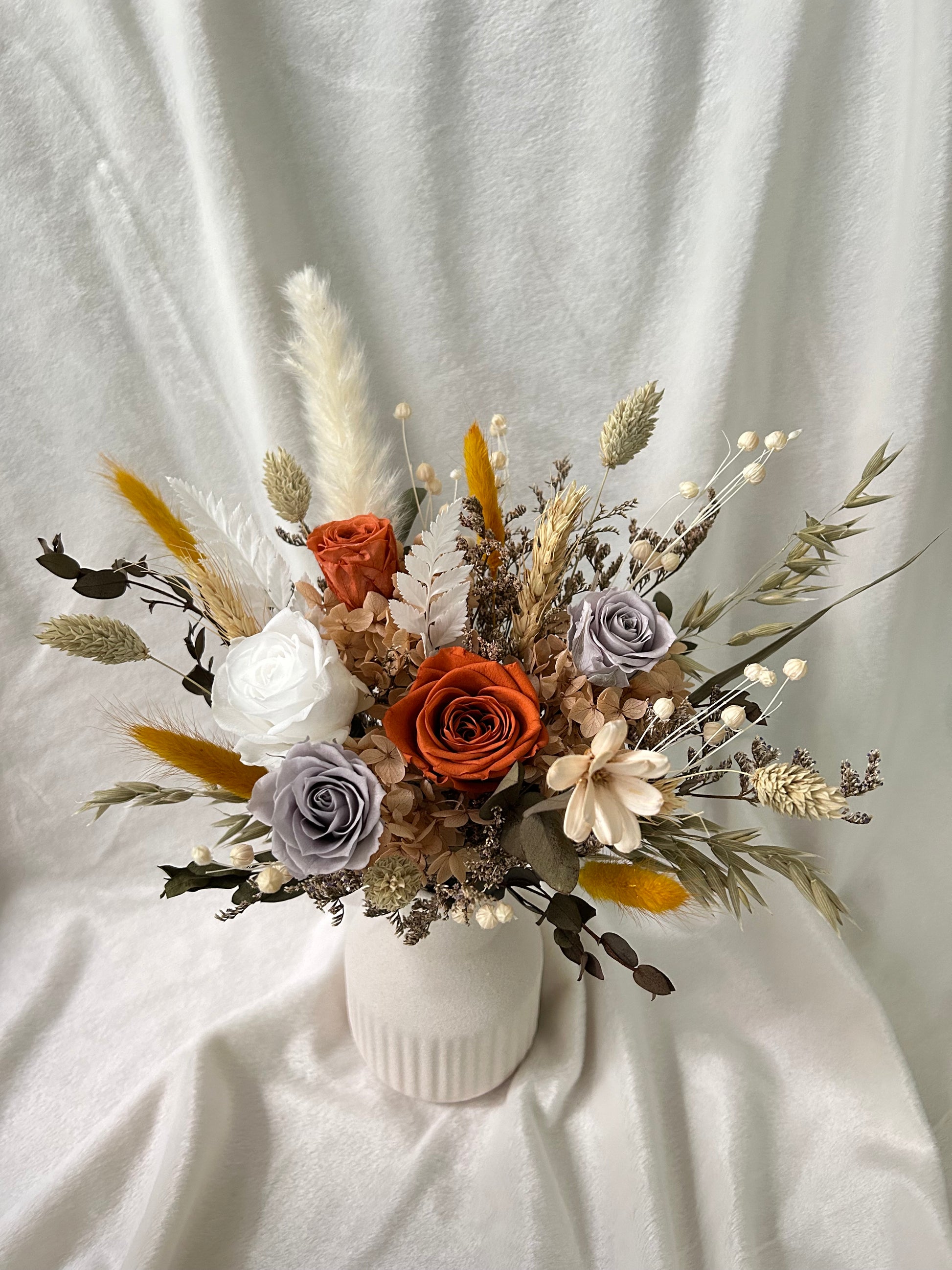 Warm orange and golden hues flower vase