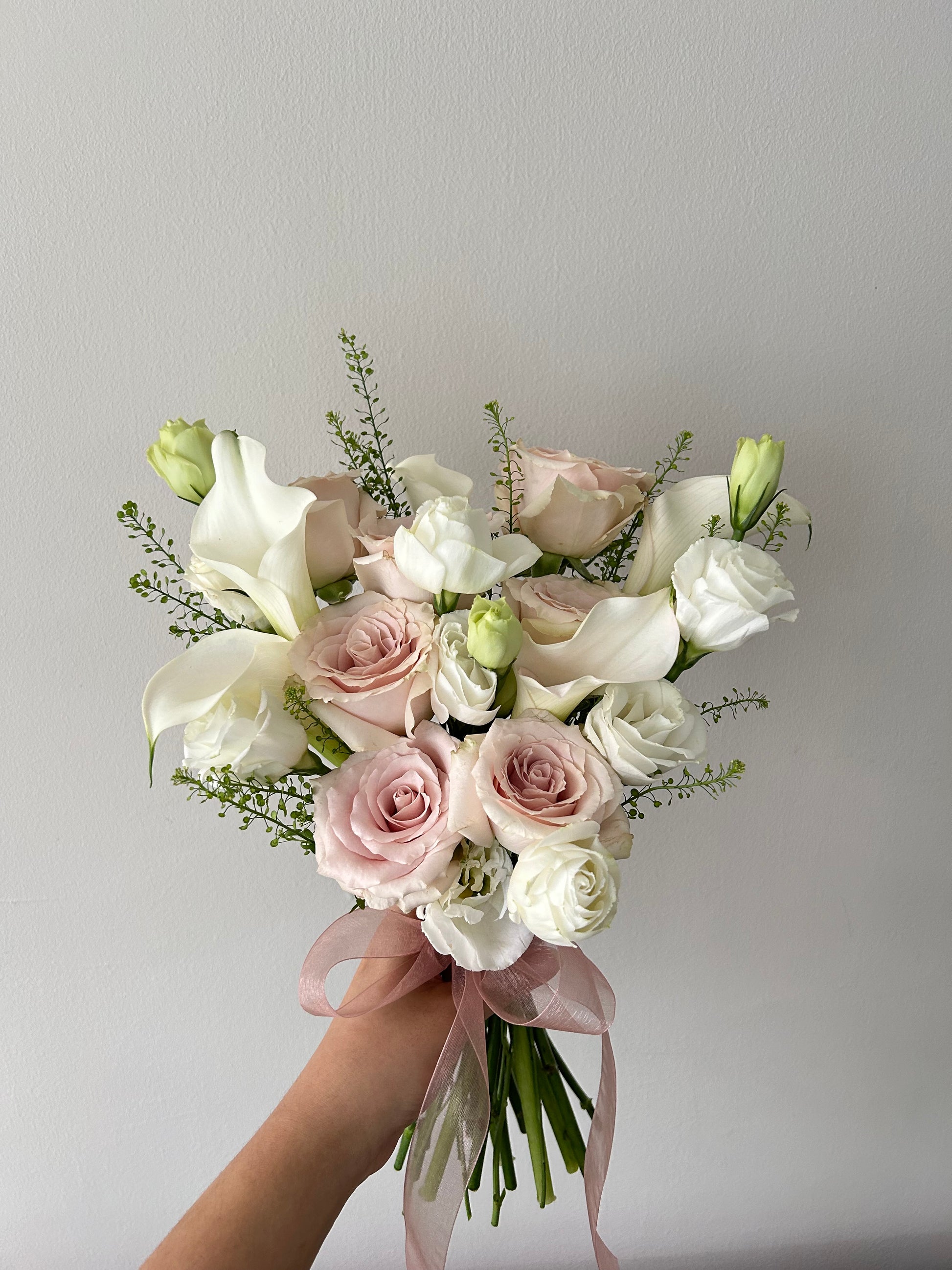 White Calla lily and pink roses wedding  bouquet