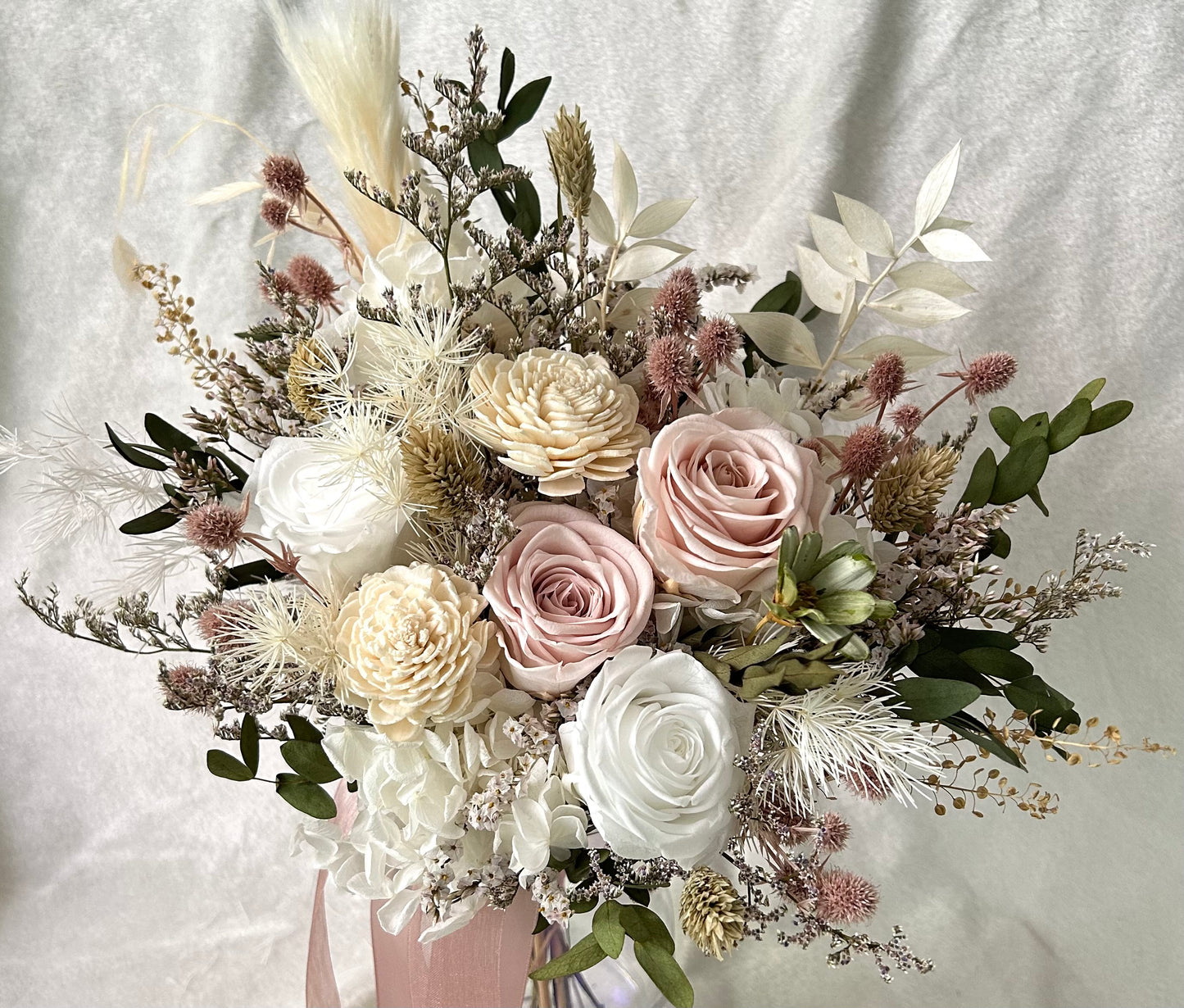 Up close bliss bridal bouquet with white and blush pink roses