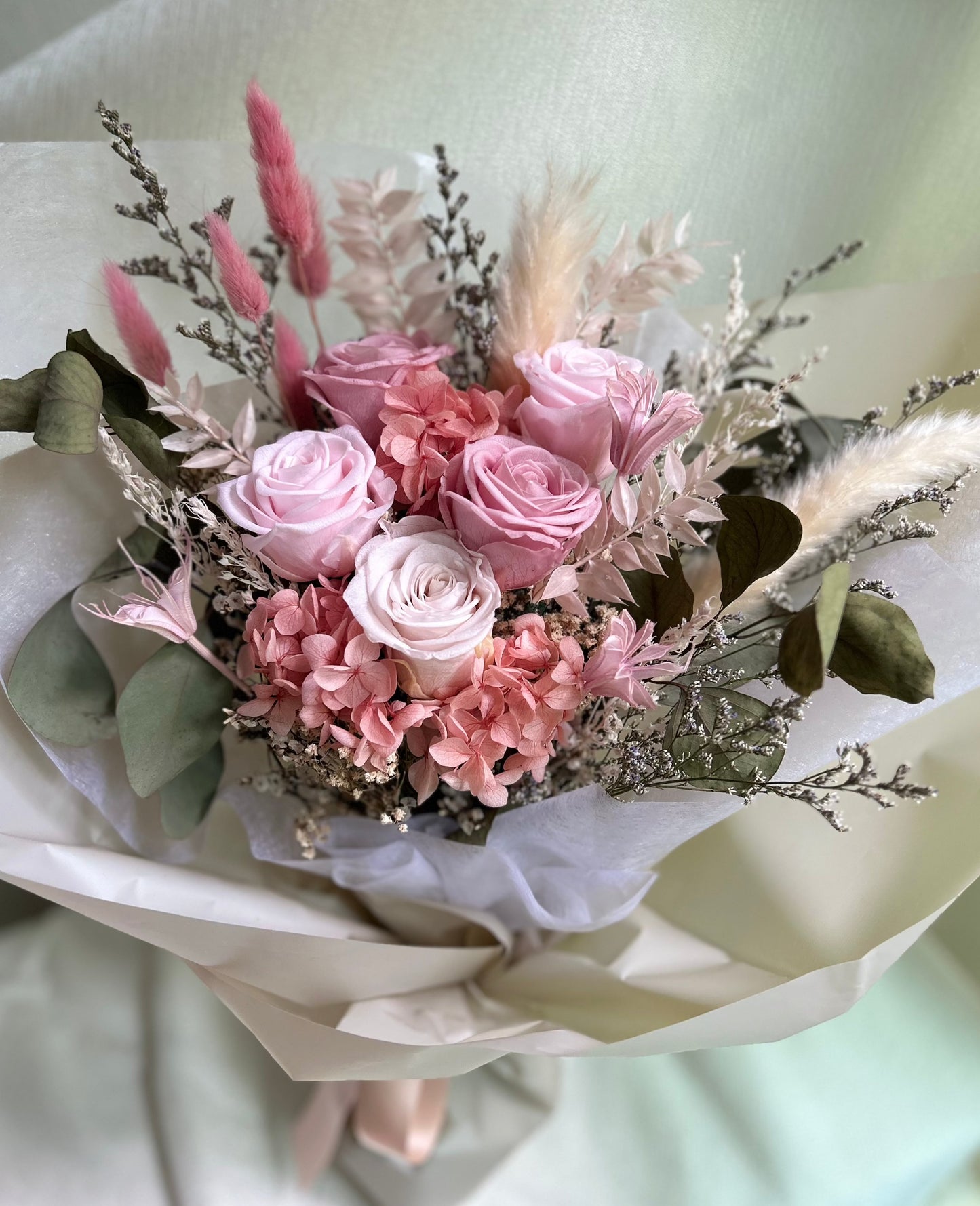 Pink rose wrapped bouquet